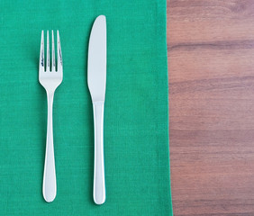 Silverware on table with napkin