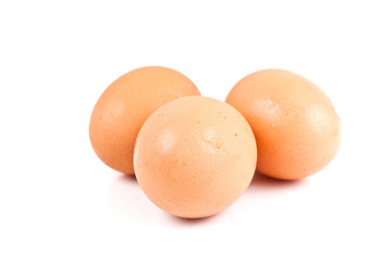 Fresh eggs isolated on the white background.
