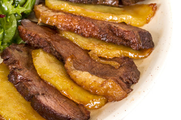 duck fillet, mashed potatoes seasoned with truffle oil, fig and