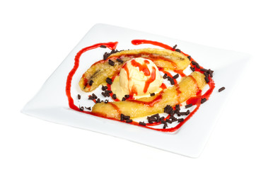 Bake banana with vanilla ice cream and caramel syrup; isolated o