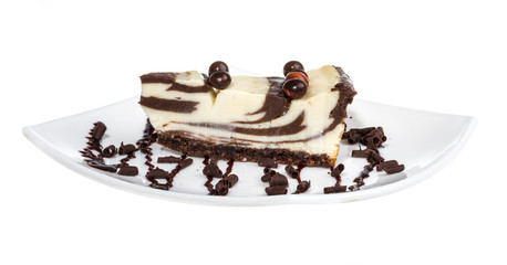 cheesecake with chocolate sauce.