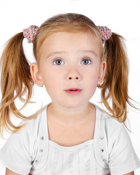 Portrait of surprised little girl isolated