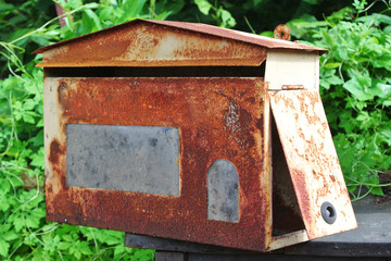 Red old mailbox isolated on white background