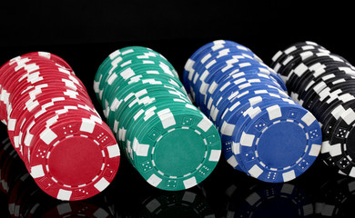 Casino chips isolated on black