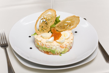 salmon under a fur coat with croutons