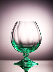 Empty cognac glass with a green tint