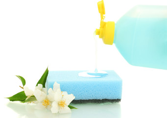 bright sponge and flowers  with dish washing liquid isolated