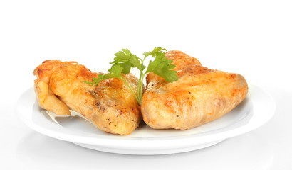 roasted chicken wings with parsley in the plate isolated