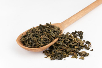 wooden spoon with green tea