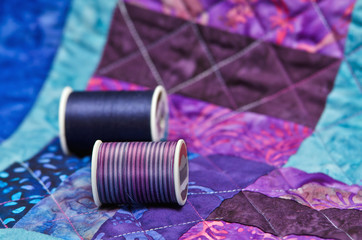 Quilt and quilting thread - obrazy, fototapety, plakaty