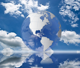 Naklejka premium Globe on the blue sky.