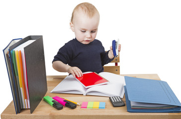 young child at writing desk