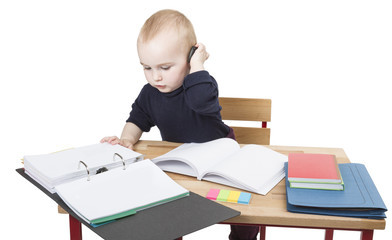 young child at writing desk