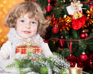 Happy child holding gift