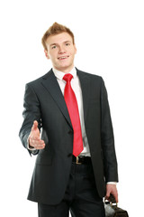A young businessman giving his hand for a handshake