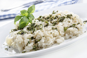 risotto rice with freshly chopped garden herbs