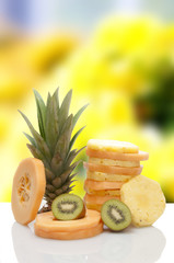 Groceries in wicker basket isolated on white