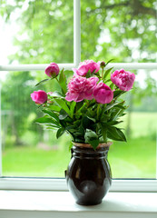 vase with peonies