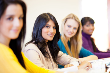 group of young female university students in classroom