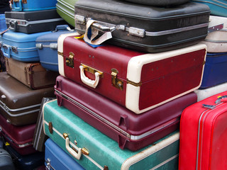 Vintage Suitcases In A Pile
