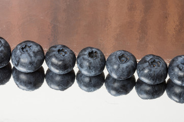 Row of blueberries on table