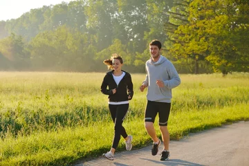 Papier Peint photo autocollant Jogging Young couple jogging