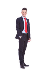 business man standing with hand in pocket
