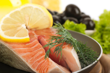 A trout is fried with a pepper and basil
