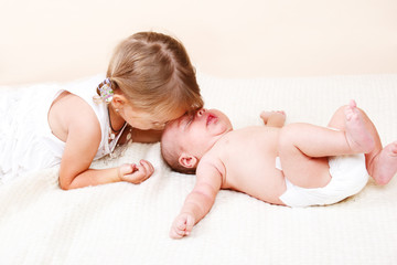 Elder sister  and newborn brother