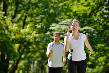 Obraz premium Young couple jogging