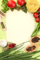 paper for recipes,vegetables and spices on green background