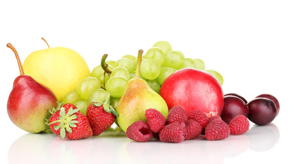 Mix of ripe sweet fruits and berries isolated on white