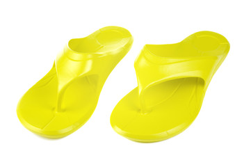 Yellow flip flops, white background