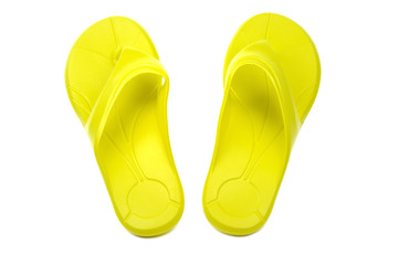 Yellow flip flops, white background