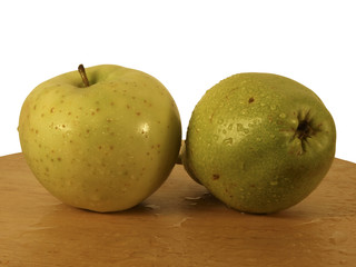 pear and apple on a wooden board