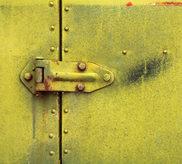 Hinge on Old Rusty Metal Door