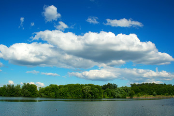 Obraz na płótnie Canvas Clouds and river