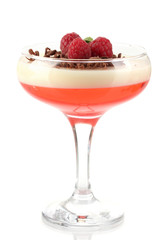 fruit jelly with chocolate and raspberries in glass isolated