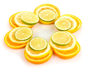 Orange lime and lemon close up isolated on white