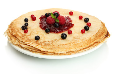 Delicious pancakes with berries and jam