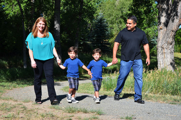 Family walking on a country road