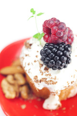muffin with whipped cream,mint, raspberries, blackberries and nu