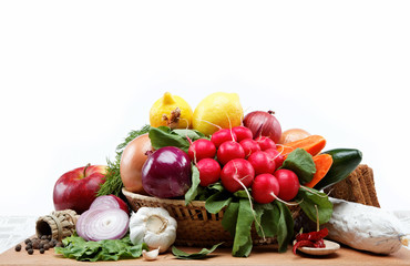 Healthy food. Fresh vegetables and fruits on a wooden board.