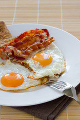 Breakfast - toasts, eggs, bacon