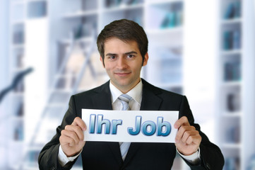 Mann mit Schild Ihr Job