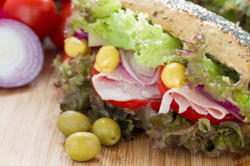 Fresh and tasty sandwich  with ham and vegetables