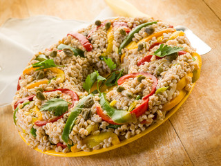 spelt doughnut with capsicum capers and parsley, vegetarian food