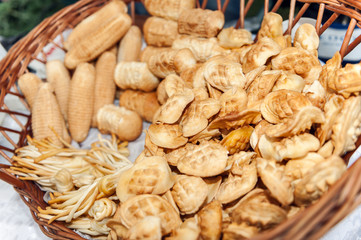 Oscypek smoked cheese from Poland in a basket