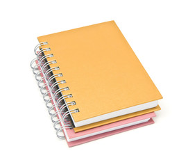 stack of ring binder book or brown notebook