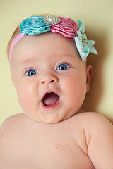 Adorable little girl with big grey eyes © Olga Uchal